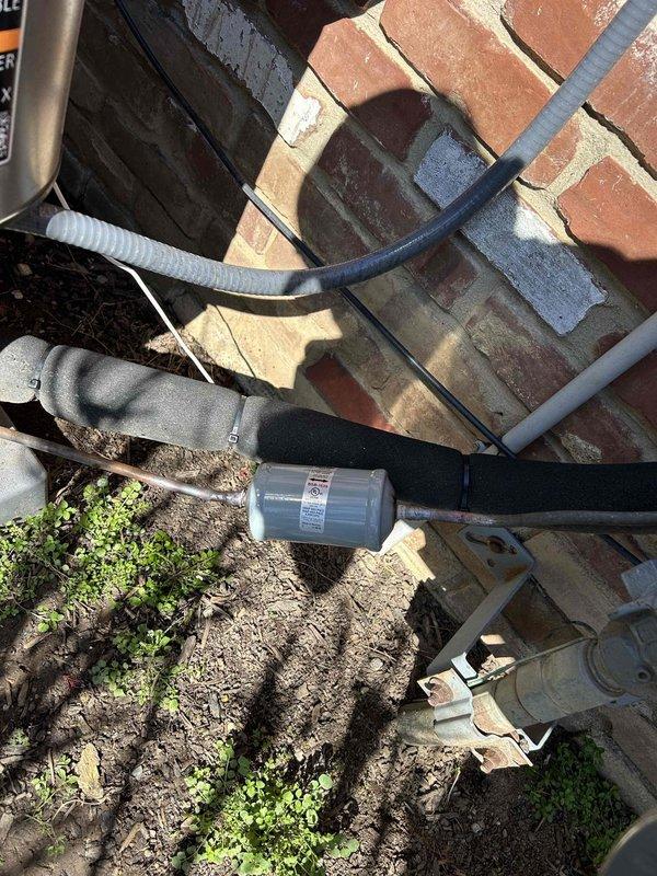 Completed first-year warranty service on Lennox system by replacing faulty compressor with new YAS30K1E-PFV-8A1 model (serial 25C8894EN). Documented installation with required photographs of both old and new compressor tags for warranty claim submission and properly sealed the old compressor as per Lennox requirements.