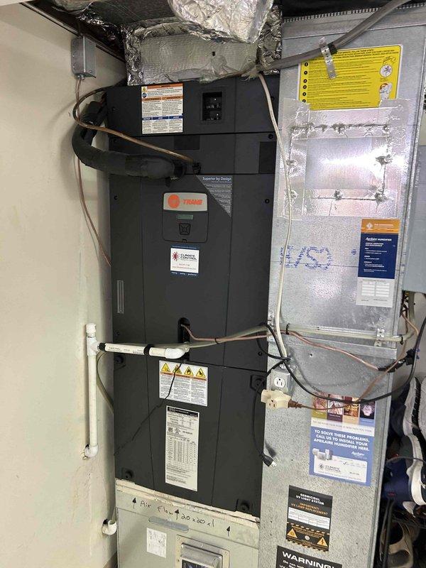 Diagnosed and serviced 6-year-old Trane heat pump system that was not providing cooling. Found error codes 184.07 and 8 on thermostat display, indicating communication failure. Determined control module requires replacement, scheduled for 2025 maintenance cycle. Performed system verification and documented current condition with photos of thermostat and air handler installation.