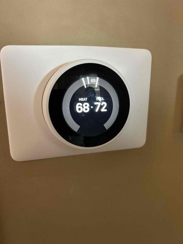 Diagnosed 5-year-old gas HVAC system with no heat issue where unit would activate but not produce warm air. Inspection revealed faulty Emerson control board with visible electronic component failure. Replaced circuit board and verified proper thermostat communication, restoring normal heating function with appropriate temperature response.