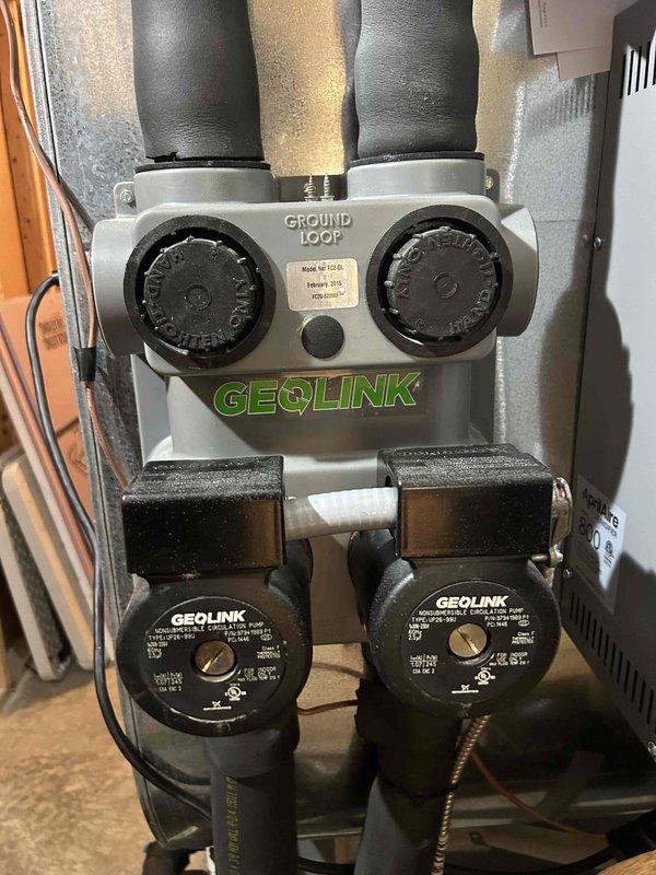 Performed annual maintenance on wall-mounted GEOLINK ground loop geothermal system located in basement. Inspected circulation pumps and verified proper operation. Checked system pressure gauge, confirming readings within manufacturer specifications. Customer supplied 30x36x2 filter which was installed during service.