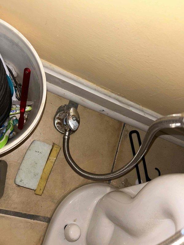 Performed routine plumbing inspection as requested. Examined bathroom supply lines and connections, confirming proper installation of braided metal hose to wall fixture with no visible leaks or damage. Tested kitchen sink faucet functionality, verifying normal water flow and proper drainage with no issues detected.