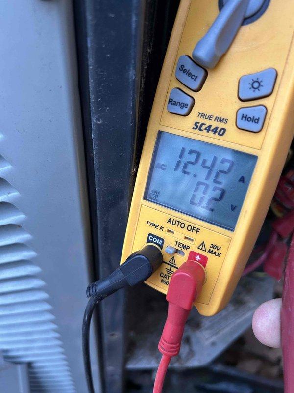 Completed Care Plan Tune Up on AC and gas furnace located in crawl space #413. Performed electrical testing with multimeter showing 12.42A/0.3V readings and inspected furnace burner assembly, verifying proper ignition and flame pattern. Recommended replacement of filter as it was not included in service.