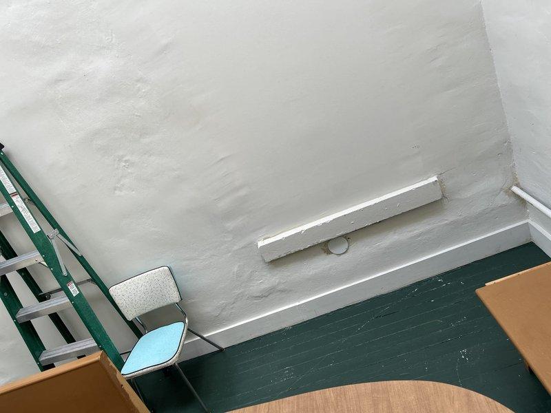 Completed plumbing repair as requested, with additional work performed as authorized by customer. Inspected wall area near electrical conduit and baseboard vent, addressing plumbing issues in that section. Modified scope of work based on assessment of required repairs.