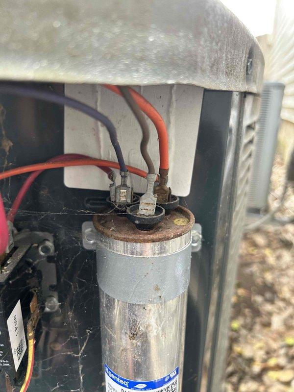 Performed routine Care Plan Tune Up on dual AC and gas furnace systems located in attic and basement. Inspected electrical components including capacitor, verified proper connections and cleaned accumulated dust. Temperature readings were taken with digital multimeter showing 76.2°F, confirming system is operating within normal parameters.