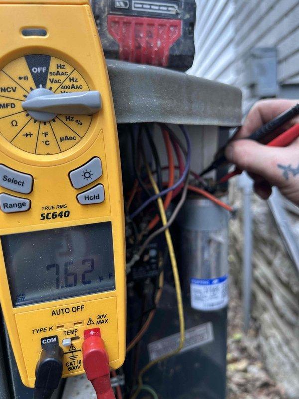 Performed routine Care Plan Tune Up on dual AC and gas furnace systems located in attic and basement. Inspected electrical components including capacitor, verified proper connections and cleaned accumulated dust. Temperature readings were taken with digital multimeter showing 76.2°F, confirming system is operating within normal parameters.