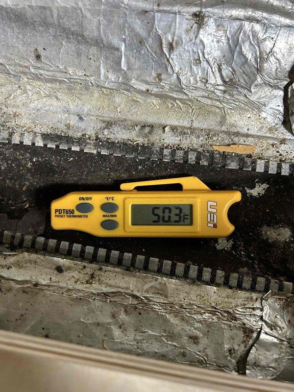 Responded to no-cool complaint on a relatively new electric system (under 3 years old) where customer reported unit unable to cool below 75°F for approximately two days. Diagnostic testing revealed supply air temperature of 50.3°F measured with PDT650 thermometer, indicating proper cooling function. Thermostat inspection showed system in "wait" mode with indoor temperature at 72°F while set to 67°F. System is functioning properly with normal temperature differential; educated customer on system operation and capabilities.