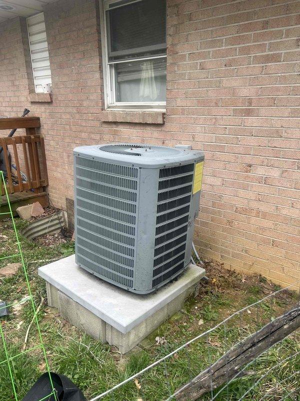 Performed comprehensive HVAC tune-up service on residential split system. Conducted thorough inspection and cleaning of outdoor condenser unit mounted on concrete pad, checking for proper clearance and removing surrounding debris. Examined indoor air handler/evaporator coil assembly, inspected copper line connections and insulation integrity, and verified proper installation of all components. System operating within normal parameters after service completion.