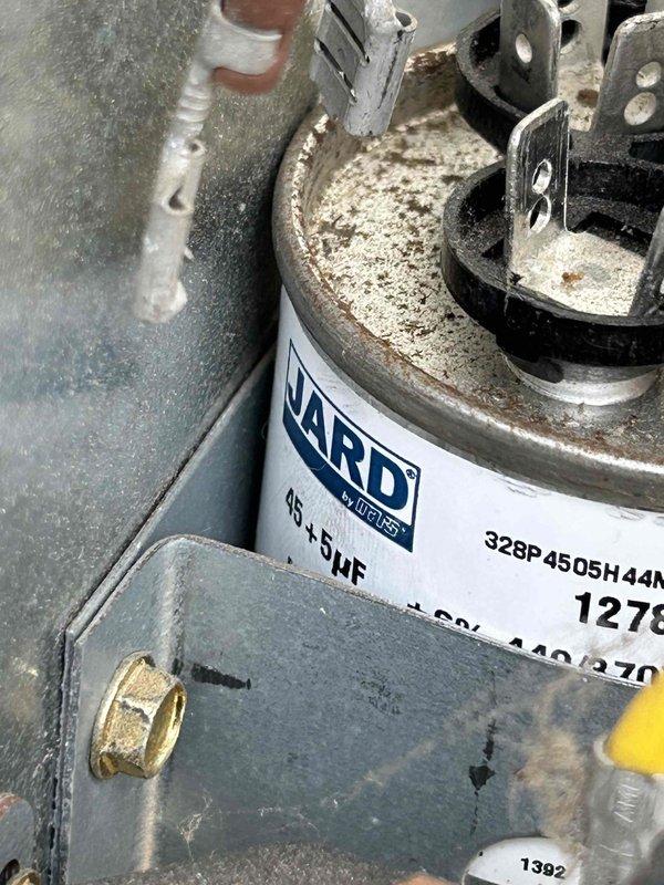 Performed Care Plan Tune Up on heat pump and air handler system located in attic. Conducted electrical testing with Fieldpiece SC440 clamp meter showing 8.75A current draw and 0.2V readings. Inspected JARD capacitor (45+5μF) which showed signs of dust accumulation but remains functional. Customer supplies filters as noted.