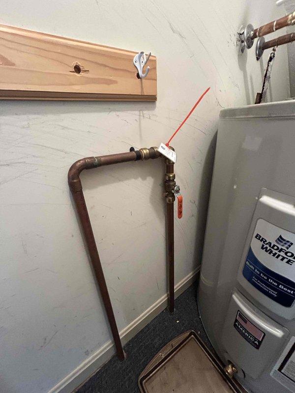 Successfully completed installation of Bradford White gas water heater, including proper drainage and removal of old unit. Hard-piped water lines with copper connections, replacing previous flexible hoses for improved durability. Performed comprehensive leak check, verified proper water heater operation, and conducted water quality testing to ensure system integrity.