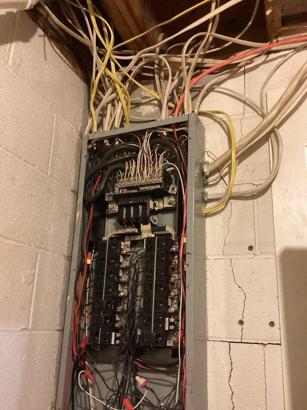 Conducted electrical estimate for generator installation and evaluated existing electrical panel to determine compatibility. Inspection of the main circuit breaker panel revealed multiple circuits with various gauge wiring and limited spare capacity. Panel assessment completed to determine if modifications would be necessary to support proposed generator installation.