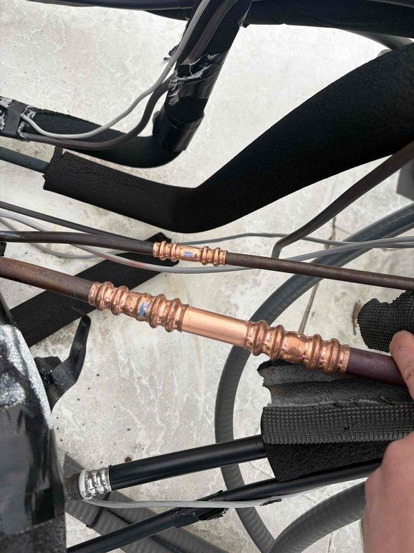 Performed lineset replacement for unit #512 due to leak. Successfully completed leak search, pressure tested the copper pipes and fittings, evacuated the system, and recharged with R-410A refrigerant according to specifications. Verified proper system operation after repair.