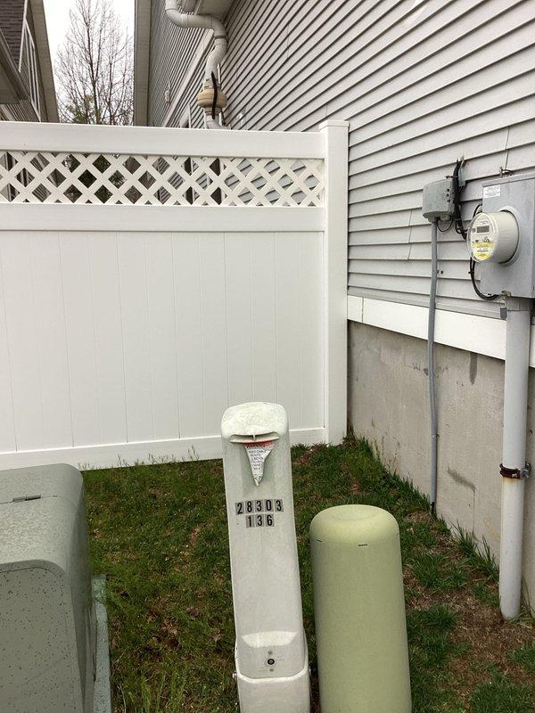Conducted site assessment for residential generator installation. Inspected electrical service entrance including FOCUS RXR-SD utility meter and evaluated property layout for optimal generator placement. Documented existing utility connections and service capacity to determine appropriate generator specifications and installation requirements.
