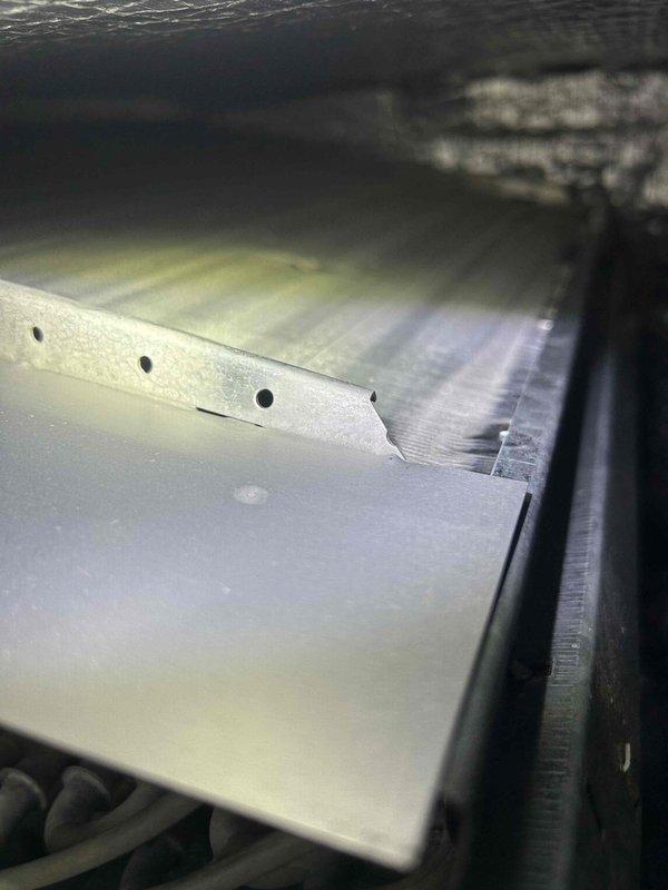 Completed Gold Level maintenance service on single HVAC system. Inspected and cleaned interior ductwork components and examined fan assembly with heat sink. System was photographed for documentation and is now operating at optimal efficiency.