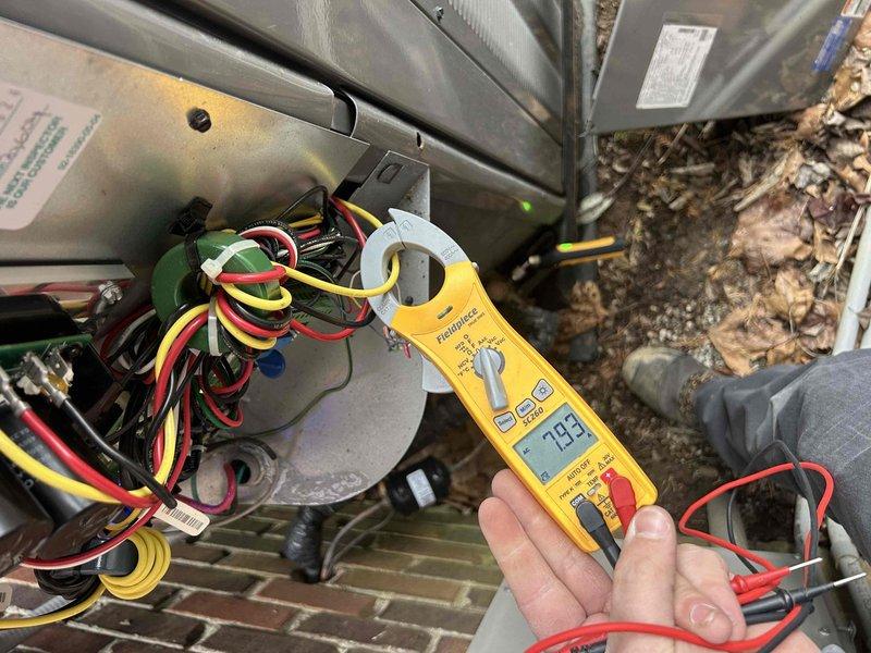 Performed annual Care Plan tune-up maintenance on two heat pump/air handler systems located in attic and basement. Inspected evaporator coils for proper condition and conducted electrical testing with clamp meter, obtaining readings of 29.3 amps during operation. Both systems are newly installed under warranty coverage, with a third system discussed for potential addition to the maintenance plan at renewal time.