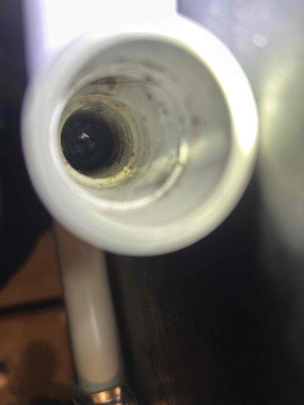 Responded to no-heat call for 4-year-old electric furnace system. Diagnosed thermostat communication failure preventing system operation. Removed and replaced clogged air filter which was restricting proper airflow, cleaned PVC exhaust vent pipe of accumulated residue, and restored system functionality. System now operating within normal parameters.