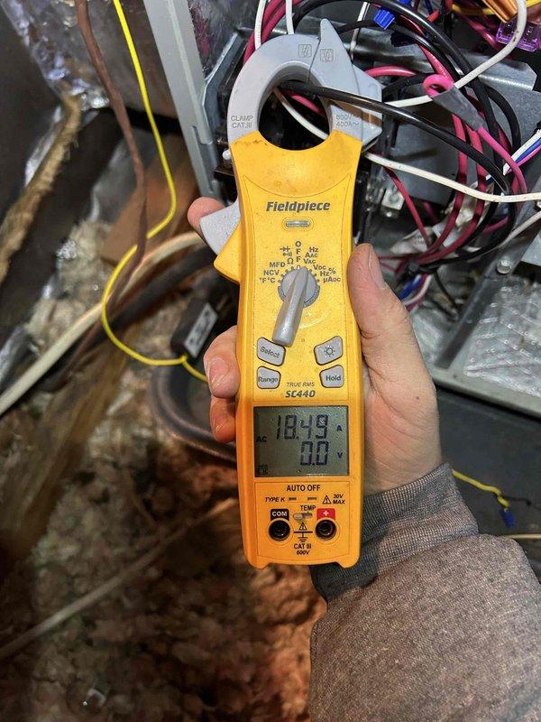 Completed annual maintenance on 9-year-old AC system scheduled for CM in 2025. Performed comprehensive AC tune-up, including temperature differential measurements (1.16ΔF) and electrical diagnostics with readings of 18.99 amps. System is functioning within specifications with no issues identified.