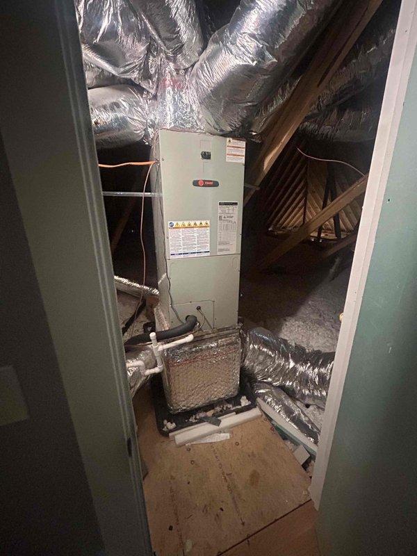 Responded to no heat call for 3-5 year old electric HVAC system that stopped functioning properly after a recent storm. Inspection revealed significant electrical panel deterioration with pest/rodent nesting material surrounding the breakers, creating a serious electrical hazard. The attic-mounted air handler was functioning properly, but the thermostat was non-operational due to the compromised electrical connection.