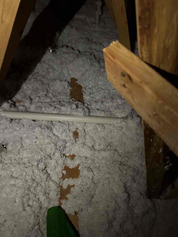 Installed supplementary blow-in insulation to address insufficient coverage in attic space. Identified and filled bare spots with one bag of insulation material to improve thermal efficiency. Documented installation with before and after photos for home inspector verification.
