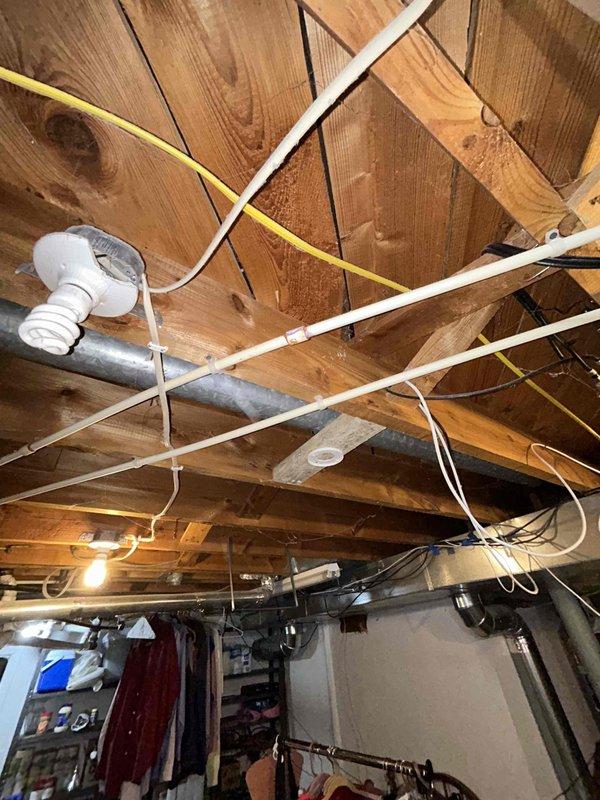 Responded to a water leak service call for an outdoor hose bibb with steady leaking. Upon inspection of the plumbing system through the exposed ceiling area, identified the source of the leak and completed necessary repairs to restore proper function. Water service was successfully restored to the home after testing to ensure leak was fully resolved.