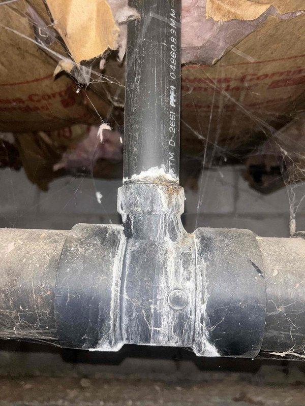 Responded to customer concerns regarding mold odor during furnace operation. Inspected crawl space area revealing moisture issues with evidence of water damage on wooden structures and improper insulation installation. Identified PVC pipe connection with mineral buildup and assessed the existing air filtration system. Replaced AprilAire filter as requested to address potential IAQ issues.