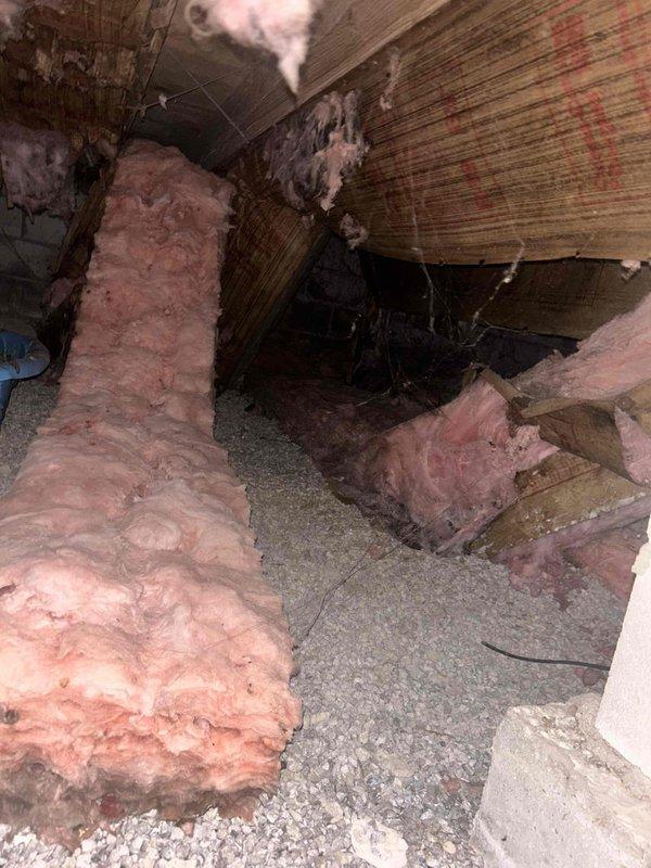 Responded to customer concerns regarding mold odor during furnace operation. Inspected crawl space area revealing moisture issues with evidence of water damage on wooden structures and improper insulation installation. Identified PVC pipe connection with mineral buildup and assessed the existing air filtration system. Replaced AprilAire filter as requested to address potential IAQ issues.
