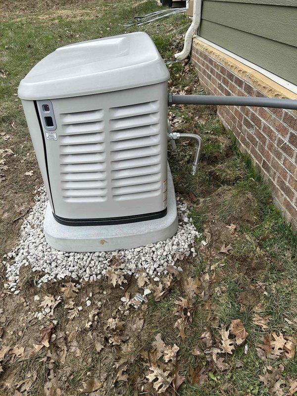 Successfully installed a 24KW air-cooled Generac generator system with 200AMP SE transfer switch featuring SPD3 protection. Configured 50 AMP load sheds with priority settings (water heaters as priorities 1 & 2, furnace heat strip as priority 3) and completed all electrical connections per code requirements. Installation was inspected and documented with photos showing proper mounting on concrete pad with appropriate clearance and all control wiring correctly terminated.