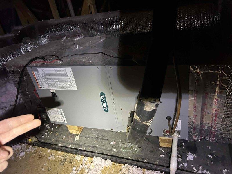 Performed scheduled Care Plan Tune Up on dual HVAC system consisting of heat pump/air handler and AC/gas furnace units located in attic and upstairs closet. Inspected McQuay air handler in attic, noting damaged insulation on refrigerant line requiring attention. Verified proper operation of Honeywell thermostat (75°F/56% humidity) and replaced filters (20x20x1 for main floor and four 12x12x1 for attic system) provided by customer.