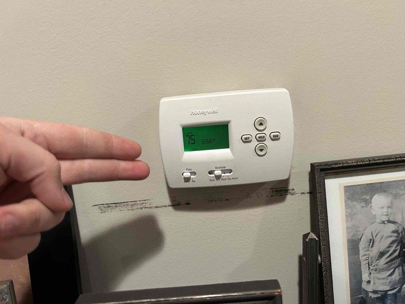 Performed scheduled Care Plan Tune Up on dual HVAC system consisting of heat pump/air handler and AC/gas furnace units located in attic and upstairs closet. Inspected McQuay air handler in attic, noting damaged insulation on refrigerant line requiring attention. Verified proper operation of Honeywell thermostat (75°F/56% humidity) and replaced filters (20x20x1 for main floor and four 12x12x1 for attic system) provided by customer.