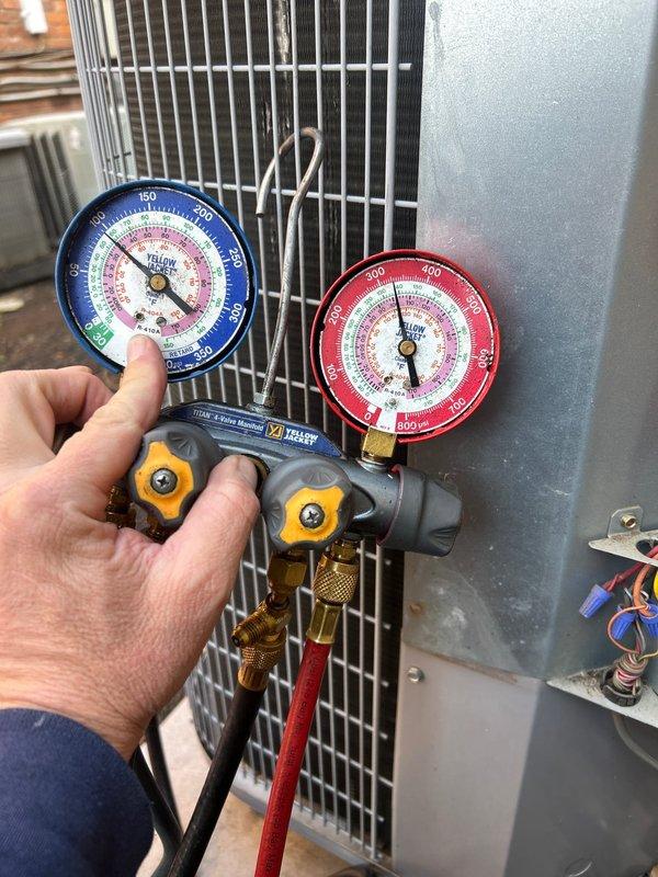 Completed Care Plan Tune Up service on multi-system installation (1 AC, 1 gas furnace, 1 heat pump, 1 air handler). Performed pressure diagnostics on refrigerant system using gauge manifold set, confirming proper operating pressures on both high and low sides. Customer provides their own air filters.