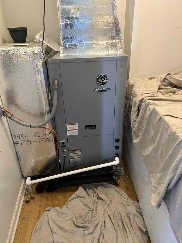 Successfully installed a WaterFurnace 3 Series Geothermal Package Unit (W3AV036BD1A01CTL0A10) with two-stage operation featuring 22.4 EER and 4.3 COP ratings. Completed installation included supplemental strip heat kit (EAL10B), flow pump center in crawl space (FC1-FPT), hose kit (CK4LI), fittings (MA4SWV), and Wi-Fi thermostat, while utilizing the existing return filter grille.