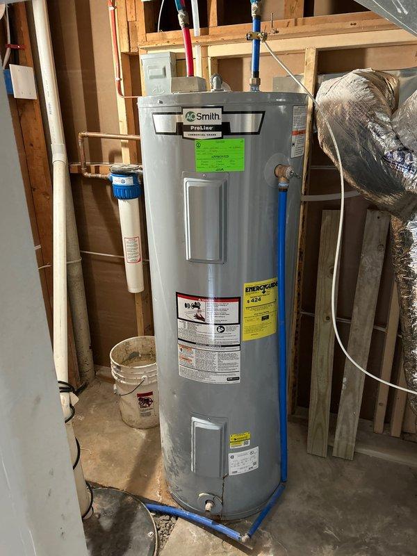 Diagnosed and replaced faulty lower heating element on A.O. Smith ProLine water heater in 70-year-old home. Inspected electrical connections to ensure proper function and verified hot water production after repair. System now operating correctly with proper temperature regulation.