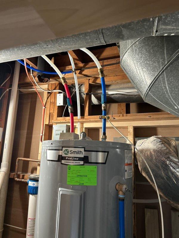 Diagnosed and replaced faulty lower heating element on A.O. Smith ProLine water heater in 70-year-old home. Inspected electrical connections to ensure proper function and verified hot water production after repair. System now operating correctly with proper temperature regulation.