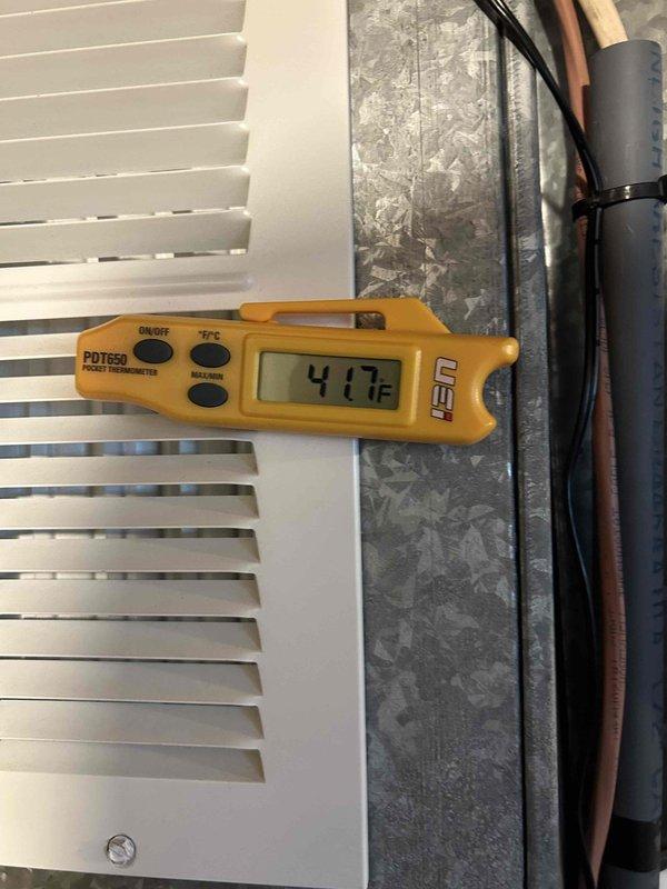 Performed Care Plan Tune Up on 2.5 HVAC systems including heat pump, air handler, AC, two gas furnaces (one located in attic), and one humidifier. Inspected gas furnace operation, verified proper flame characteristics and electrical connections. Temperature readings confirmed proper system operation at 41.7°F supply air, indicating normal cooling performance.