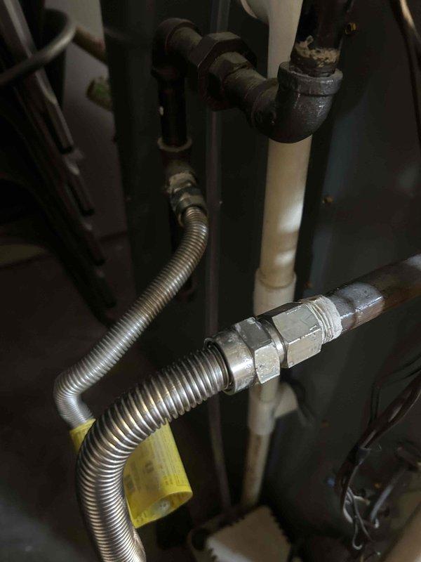 Responded to emergency gas leak in HVAC system reported by fire department. Inspected flexible gas line connections and found faulty seal at the furnace connection point. Shut off gas supply, replaced damaged fittings on the corrugated gas line, and performed pressure testing to verify system integrity before restoring service.
