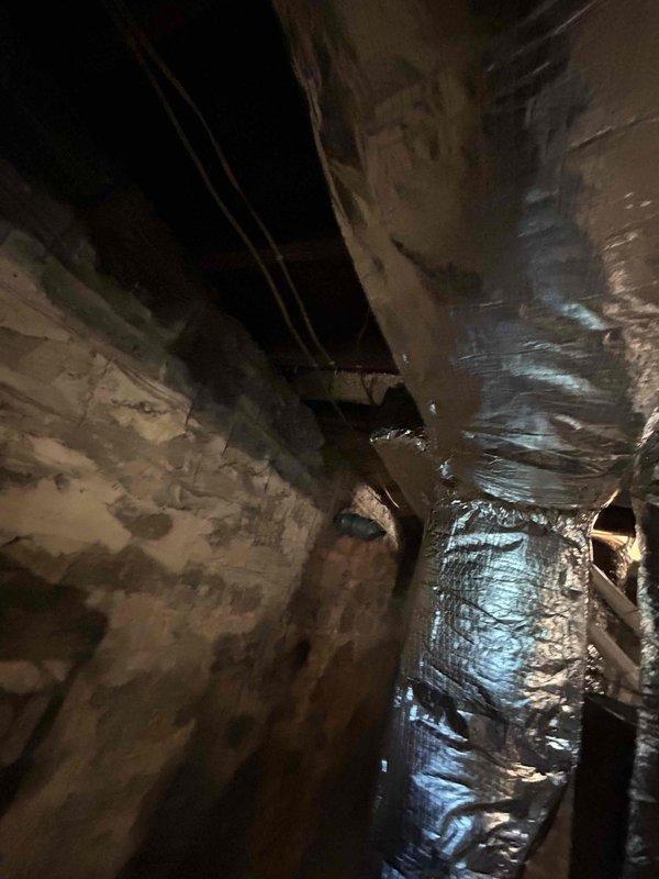 Completed comprehensive ductwork replacement throughout basement, including installation of new insulated supply trunk duct, R6 sealed insulated flex supply runs, and insulated supply plenum. Performed targeted repairs to damaged return panning with proper sealing, insulated return trunk duct and return drop with foil wrap, and installed new 14x6 flat return grille along with replacement of supply registers and floor boots as needed.