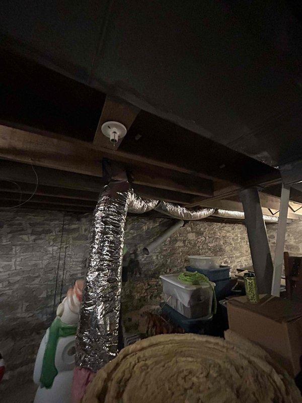 Completed comprehensive ductwork replacement throughout basement, including installation of new insulated supply trunk duct, R6 sealed insulated flex supply runs, and insulated supply plenum. Performed targeted repairs to damaged return panning with proper sealing, insulated return trunk duct and return drop with foil wrap, and installed new 14x6 flat return grille along with replacement of supply registers and floor boots as needed.