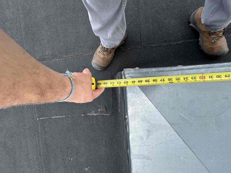 Conducted site assessment for HVAC system replacement at church property. Took measurements of existing rooftop area where previous RTU systems were installed. Documented dimensions for preparing comprehensive estimate options for partial and complete building HVAC replacement to replace current temporary window units.
