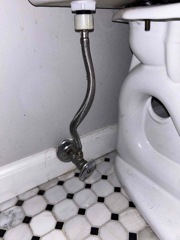 # Job Description

Responded to service call for bathroom plumbing issues involving a leaking faucet handle and continuously running toilet. Upon arrival, performed diagnostic inspection of the affected toilet and surrounding plumbing fixtures. Identified internal fill valve malfunction causing continuous water flow into tank. Inspected flexible supply line connection beneath vanity sink and verified proper installation of braided metal supply hose and shut-off valve assembly. Addressed toilet running issue by adjusting/replacing fill valve components to restore proper water shutoff function. Verified faucet connections for leaks and tightened supply line fittings as needed. Tested toilet flush mechanism for proper operation and confirmed water level settings were correctly adjusted. All fixtures returned to normal operating condition with no active leaks detected upon completion.