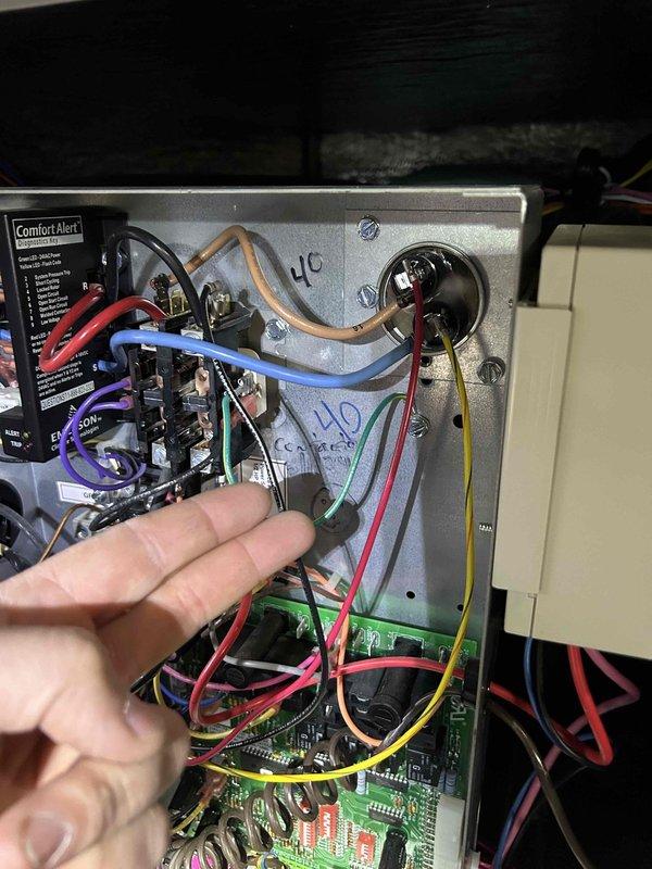 # HVAC Maintenance - Club Single Service Report

Completed comprehensive Care Plan tune-up service on geothermal and split system with humidifier located in basement and attic areas. Performed detailed inspection of geothermal heat pump control panel, verifying proper operation of ComfortAlert diagnostic module, checking all wire connections at terminal blocks, and examining control board functionality. Inspected dual GEOLINK circulator pumps mounted on hydronic loop system, confirming both Grundfos units operating within specifications and PVC piping connections secure. Replaced air filters per maintenance plan specifications: 28x30x2 and 16x25x4 filters installed at designated locations. All system components tested and found operating normally with no issues identified.