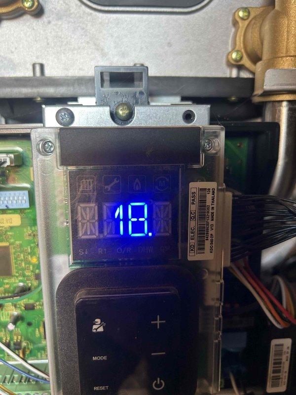 # Service Call Back - No Cooling Issue

Responded to callback for intermittent cooling failure on HVAC system. Upon arrival, inspected control board and thermostat displaying error code 18, indicating a potential refrigerant pressure or sensor issue. Performed diagnostic testing on pressure relief valve and associated copper refrigerant lines in mechanical space. Verified proper operation of control module functions including mode selection and reset capabilities. Documented system components via photographs showing control interface readings and pressure valve configuration. System pressure readings and valve positions were checked and found within normal operating parameters at time of inspection. Advised monitoring for recurring symptoms and provided callback number for immediate dispatch if issue returns. Further investigation may be required if intermittent fault continues to determine root cause of cycling failure pattern.