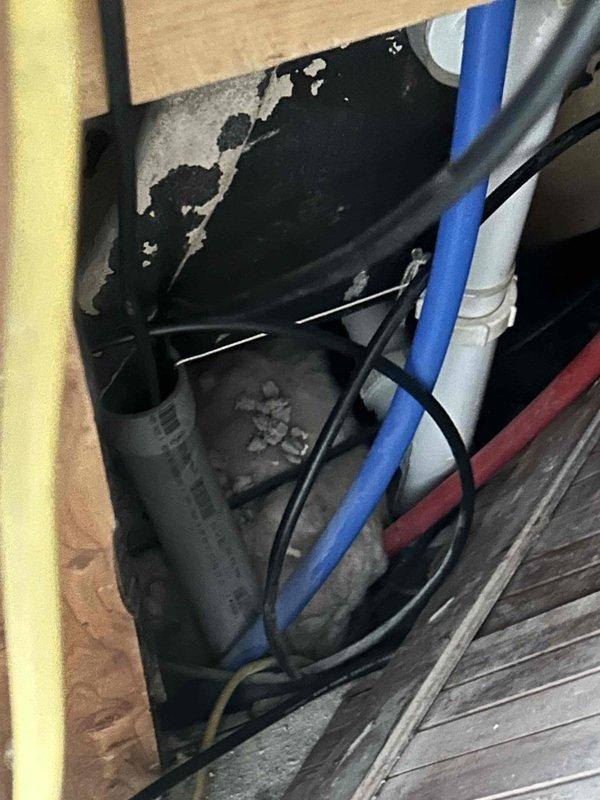 Responded to service call for dual HVAC system with both units short cycling and blowing warm air. Performed diagnostic evaluation of upstairs and downstairs air conditioning systems, both experiencing intermittent operation with no thermostat error codes displayed. Inspected attic-mounted air handler units, electrical control panels, and associated refrigerant lines. Documented equipment conditions and system configurations for both zones to determine root cause of cooling failure and cycling issues.