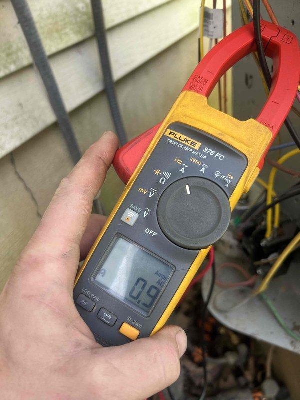 Completed comprehensive Care Plan tune-up on heat pump and air handler system installed in 2016. Performed electrical diagnostics using clamp meter, measuring amperage draws on compressor (65 amps) and blower motor (0.9 amps) to verify proper operation within manufacturer specifications. Inspected all electrical connections, contactor, capacitor, and wiring at both indoor and outdoor units, confirming system operating safely and efficiently.