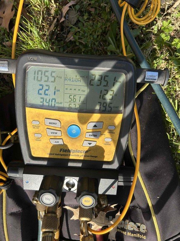 Responded to no cooling complaint on 13-year-old HVAC system. Upon arrival, confirmed unit was running but not producing cool air. Performed diagnostic evaluation using refrigeration manifold gauges and digital thermometer to assess system performance. Gauge readings indicated abnormal operating pressures with high-side pressure at 275 psig and low-side pressure at 1055 psig, along with temperature differentials of 22.1°F and 12.3°F, suggesting significant refrigerant system issues. Measured supply air temperature at 680°F, confirming lack of cooling capacity. Inspected indoor air handler unit located in hallway, examined refrigerant line set including copper suction and liquid lines, and checked system components. Based on diagnostic findings and age of equipment, provided customer with assessment of system condition and repair options necessary to restore cooling function.