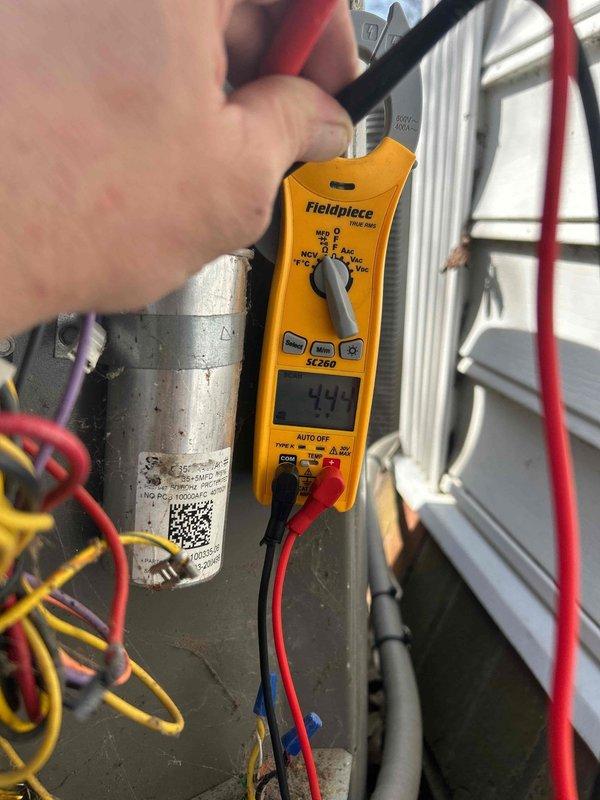 Completed routine AC tune-up maintenance on two residential HVAC systems. Performed comprehensive diagnostics including capacitor testing and electrical measurements, with readings of 494 and 4.4 microfarads recorded using calibrated testing equipment. All systems inspected, tested, and found to be operating within normal parameters.
