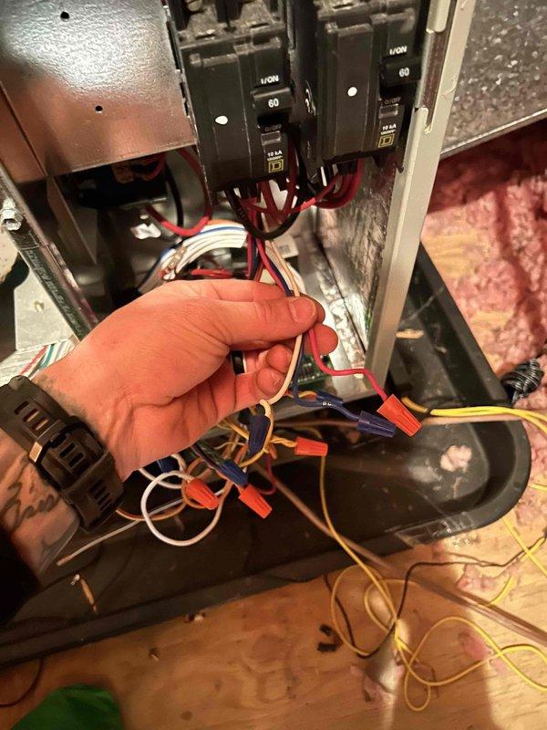 Responded to callback for non-operational HVAC system after multiple previous service visits. Upon inspection, discovered severe mold and debris contamination throughout blower assembly and air handler cabinet, which was causing system failure. Performed electrical diagnostics at breaker panel to verify power supply and circuit integrity. Documented extensive contamination on blower wheel and surrounding components requiring immediate attention. Recommended complete system cleaning and possible blower assembly replacement due to excessive buildup preventing proper airflow and operation.