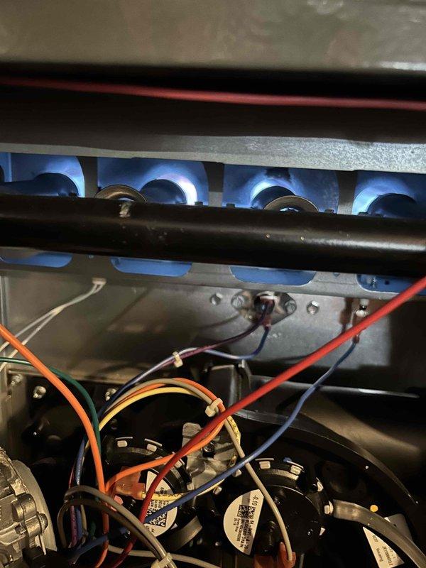 Completed comprehensive care plan maintenance on a 5-year-old heat pump and gas furnace system with the furnace located in the basement. Performed standard tune-up procedures including inspection of the evaporator coil, which showed significant frost accumulation indicating proper refrigerant operation, and verified gas furnace combustion with all four burners igniting properly and producing clean blue flames. Inspected blower motor assembly, electrical connections, and control wiring; all components found to be functioning within normal operating parameters.
