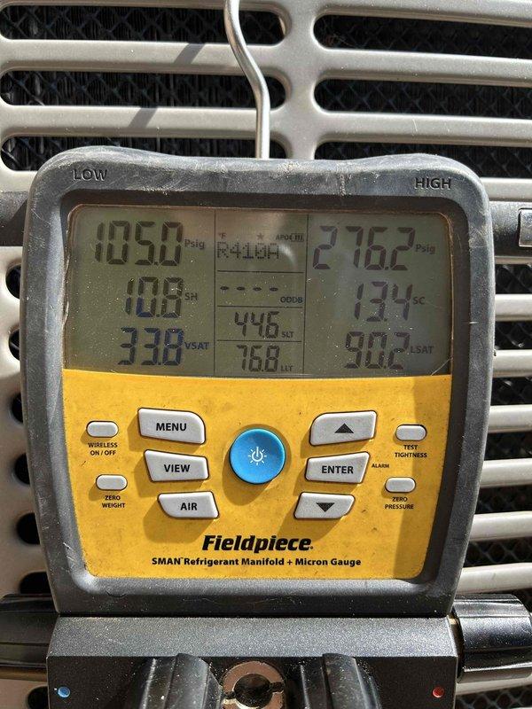 Replaced defective condenser fan motor on outdoor air conditioning unit. Verified system operation with refrigerant manifold gauge, confirming proper R410A pressures and system performance following motor replacement. Unit tested and operating within manufacturer specifications.