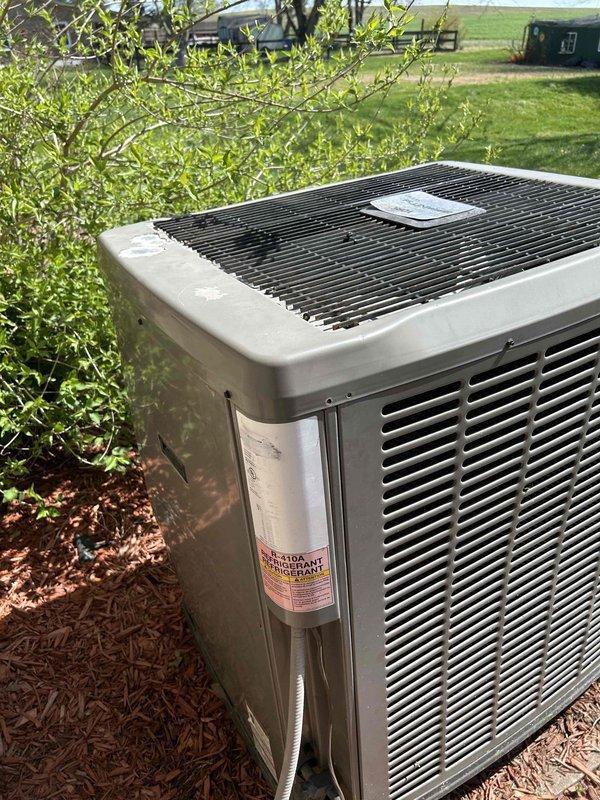 Replaced defective condenser fan motor on outdoor air conditioning unit. Verified system operation with refrigerant manifold gauge, confirming proper R410A pressures and system performance following motor replacement. Unit tested and operating within manufacturer specifications.
