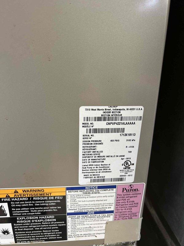 Completed Gold Level prepaid maintenance on a single-system residential HVAC installation. Inspected Carrier furnace/air handler unit located in basement utility area and outdoor condensing unit (Model CNPVP4221ALAAAA, Serial 1713X18113) containing R-410A refrigerant. Provided and installed customer-supplied air filter #413 as part of membership benefits during spring maintenance visit. Verified all manufacturer specification labels, safety warnings, and refrigerant information were legible and intact on both indoor and outdoor equipment. Documented equipment condition through photographs showing ductwork connections, humidifier attachment, electrical wiring, and overall system operation.