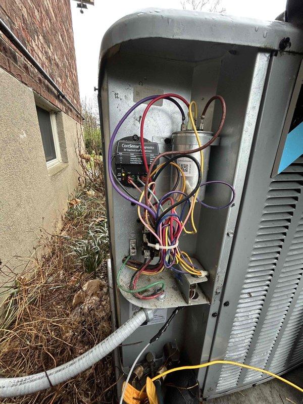 Completed comprehensive care plan tune-up on 2022 AC/gas furnace system located in basement. Upon inspection, discovered evaporator coil completely covered in thick frost and ice buildup, indicating restricted airflow or refrigerant issues. Assessed outdoor condensing unit, inspecting electrical components, capacitor, and control module (CorSense system). Documented frozen coil condition and electrical panel configuration with photographic evidence. Customer to provide filters for system maintenance.